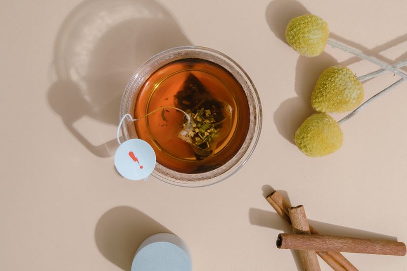 overhead image of a superbolt tea bag inside a clear cup